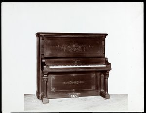 A piano by Newby and Evans Piano Co., 1907 by Byron Company